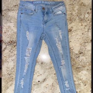 Light blue ripped distressed skinny jeans